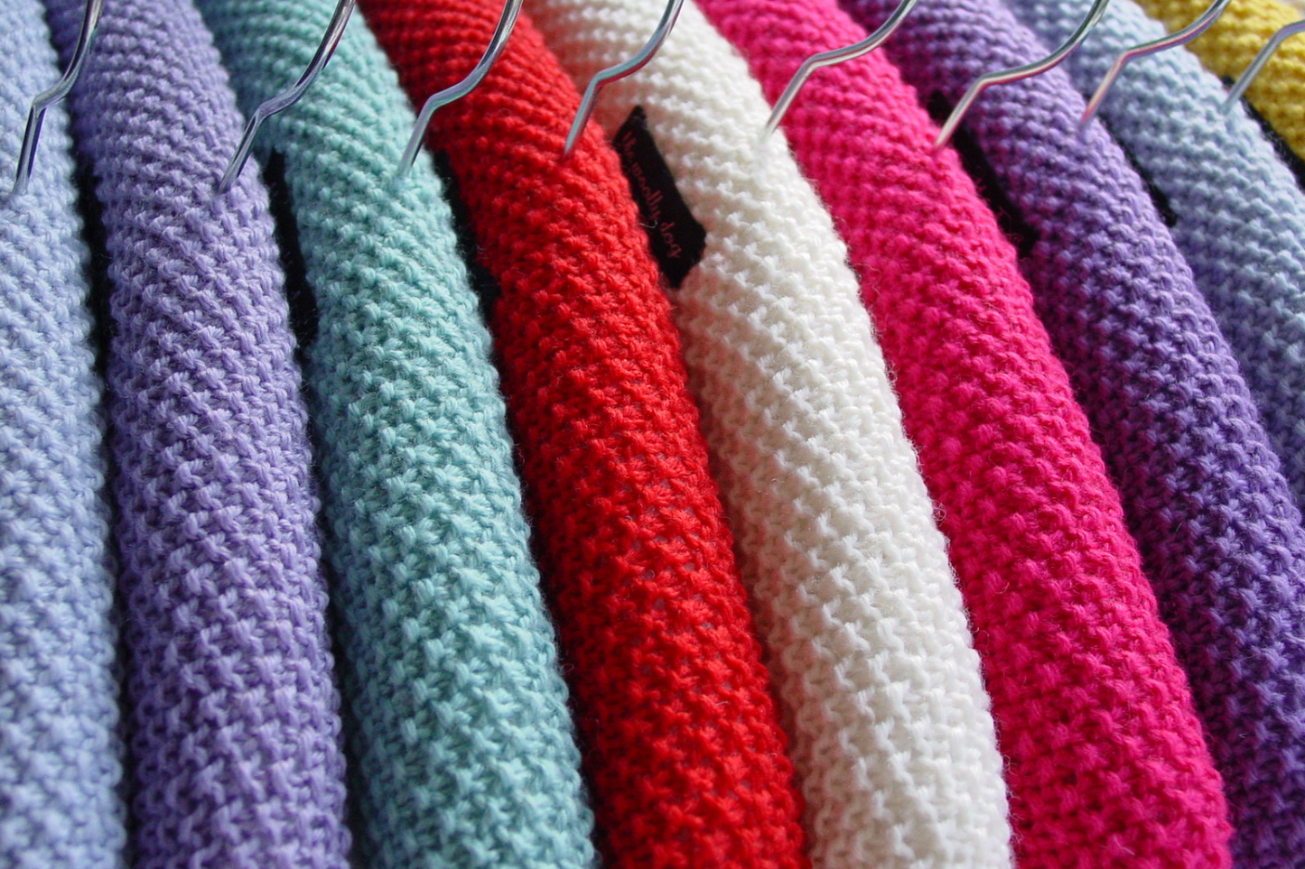 Children's Padded Hanger In Yellow
Beautifully hand knitted with Rowan pure new wool in a moss stitch pattern, this pretty children's hanger is perfect for hanging or displaying children's clothes or as a photo prop and would make a wonderful baby shower or newborn gift.
Sold separately, other colours can be found in the shop listings.
Size approximately: 34cm / 13 + 1/2"