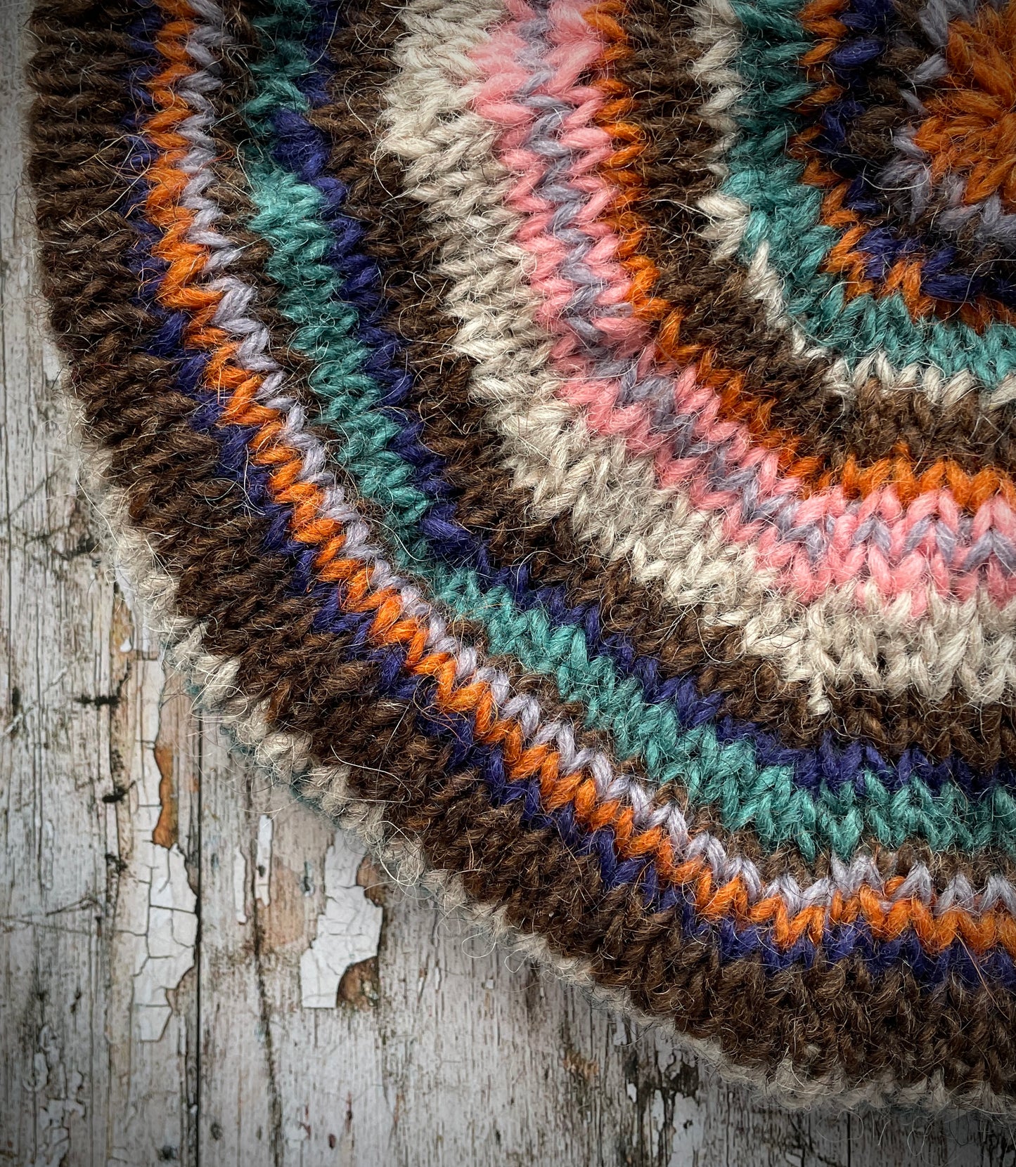 Classic 40's Style Beret no.28
Beautifully hand knitted beret in Icelandic Lettlopi wool, perfect for keeping your head warm on cold days and adding a touch of 40's style to any outfit. Knitted in oat, viridian, dark chocolate brown, pink, lavender, purple and orange stripes, with an oat ribbed band that gives the hat a snug fit.
SIZE: adult.
CARE: hand wash or machine wash on wool cycle at 30 degrees, dry flat, do not tumble dry.