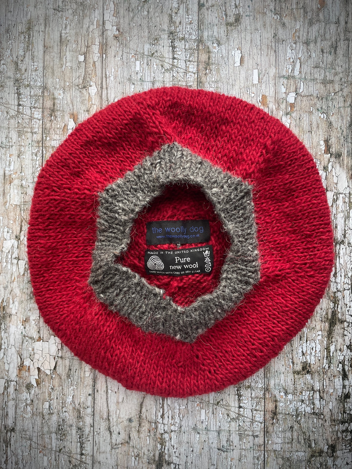 Hand Knitted Wool Beret Red + Grey Tweed
Beautifully hand knitted beret in Icelandic pure wool, perfect for keeping your head warm on cold days. Knitted in red with a grey pom and grey ribbed band that gives the hat a snug fit.
SIZE: adult.
CARE: hand wash or machine wash on wool cycle at 30 degrees, dry flat, do not tumble dry.