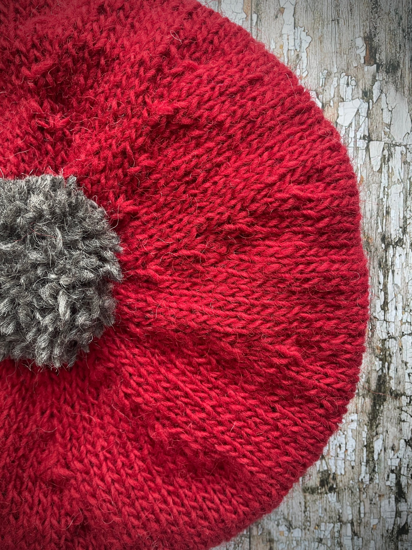 Hand Knitted Wool Beret Red + Grey Tweed
Beautifully hand knitted beret in Icelandic pure wool, perfect for keeping your head warm on cold days. Knitted in red with a grey pom and grey ribbed band that gives the hat a snug fit.
SIZE: adult.
CARE: hand wash or machine wash on wool cycle at 30 degrees, dry flat, do not tumble dry.