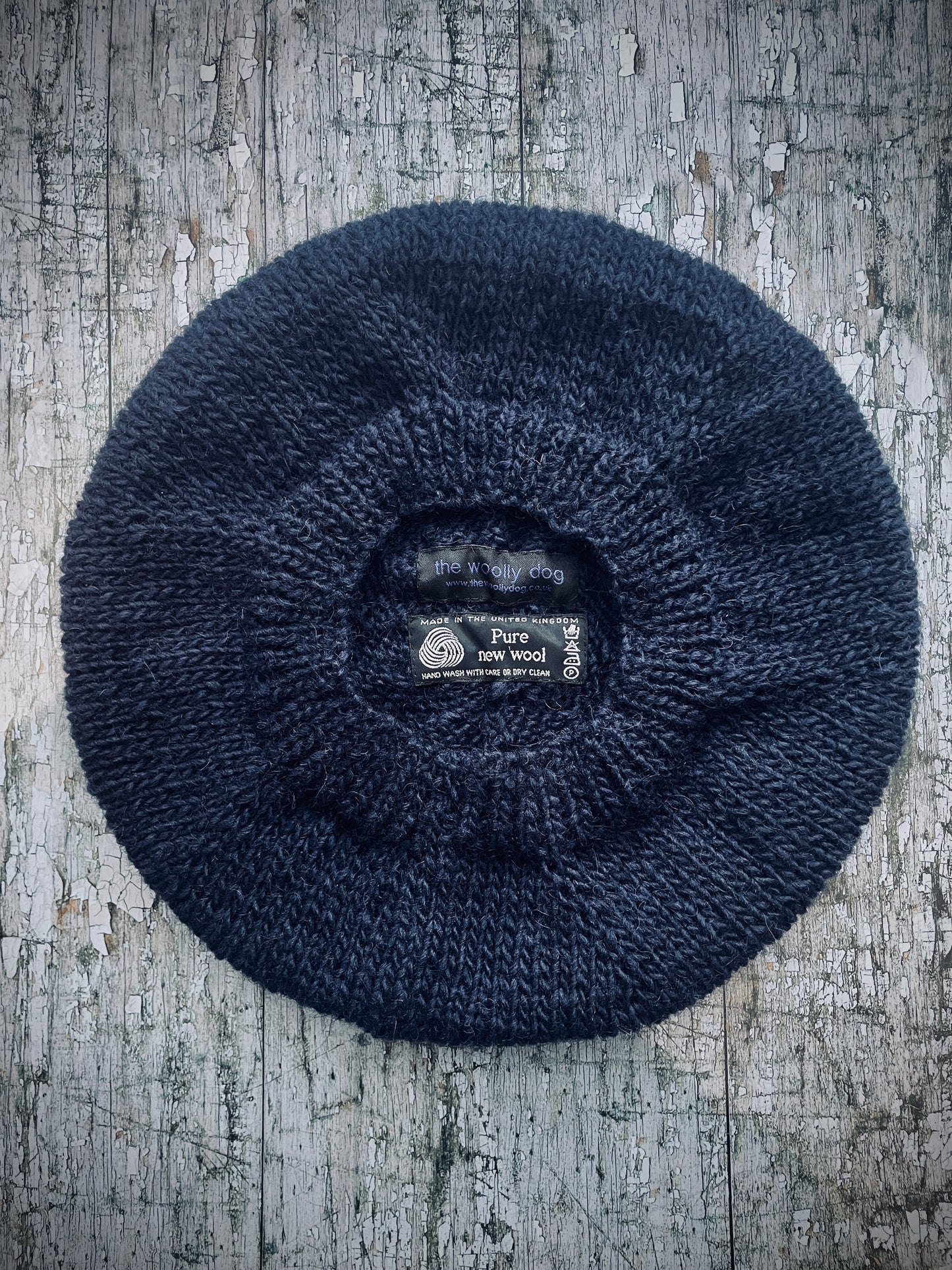 Large Hand Knitted Wool Beret Dark Navy Blue
Beautifully hand knitted slouchy beret in Icelandic pure wool, perfect for keeping your head warm on cold days, knitted in a dark navy blue colour, with a ribbed band that gives the hat a snug fit.
SIZE: LARGE.
CARE: hand wash or machine wash on wool cycle at 30 degrees, dry flat, do not tumble dry.