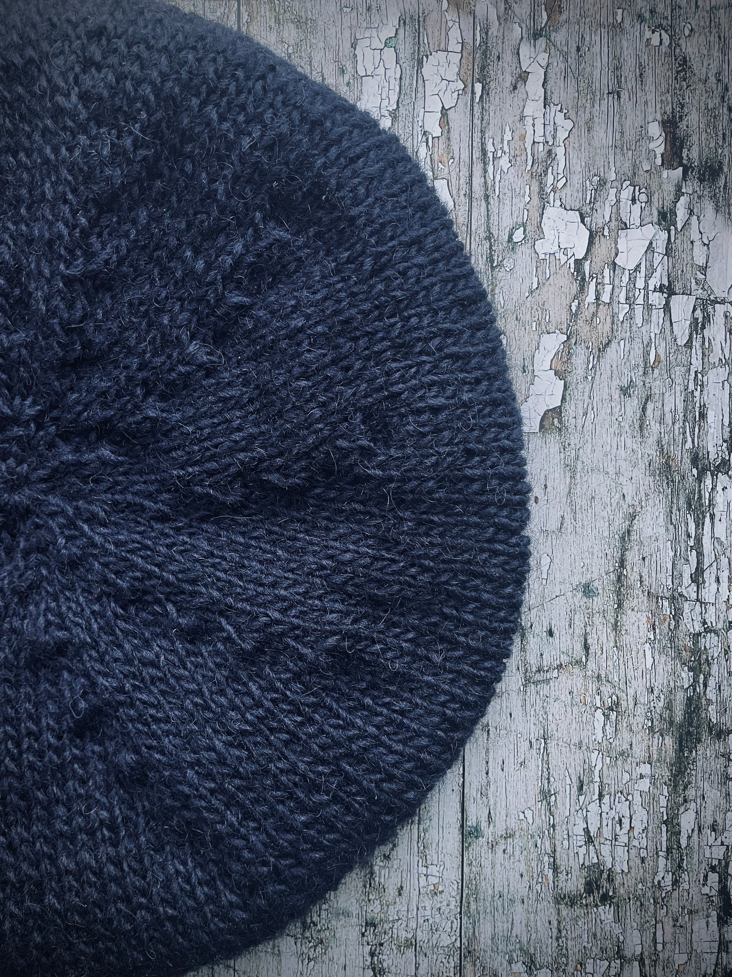 Large Hand Knitted Wool Beret Dark Navy Blue
Beautifully hand knitted slouchy beret in Icelandic pure wool, perfect for keeping your head warm on cold days, knitted in a dark navy blue colour, with a ribbed band that gives the hat a snug fit.
SIZE: LARGE.
CARE: hand wash or machine wash on wool cycle at 30 degrees, dry flat, do not tumble dry.