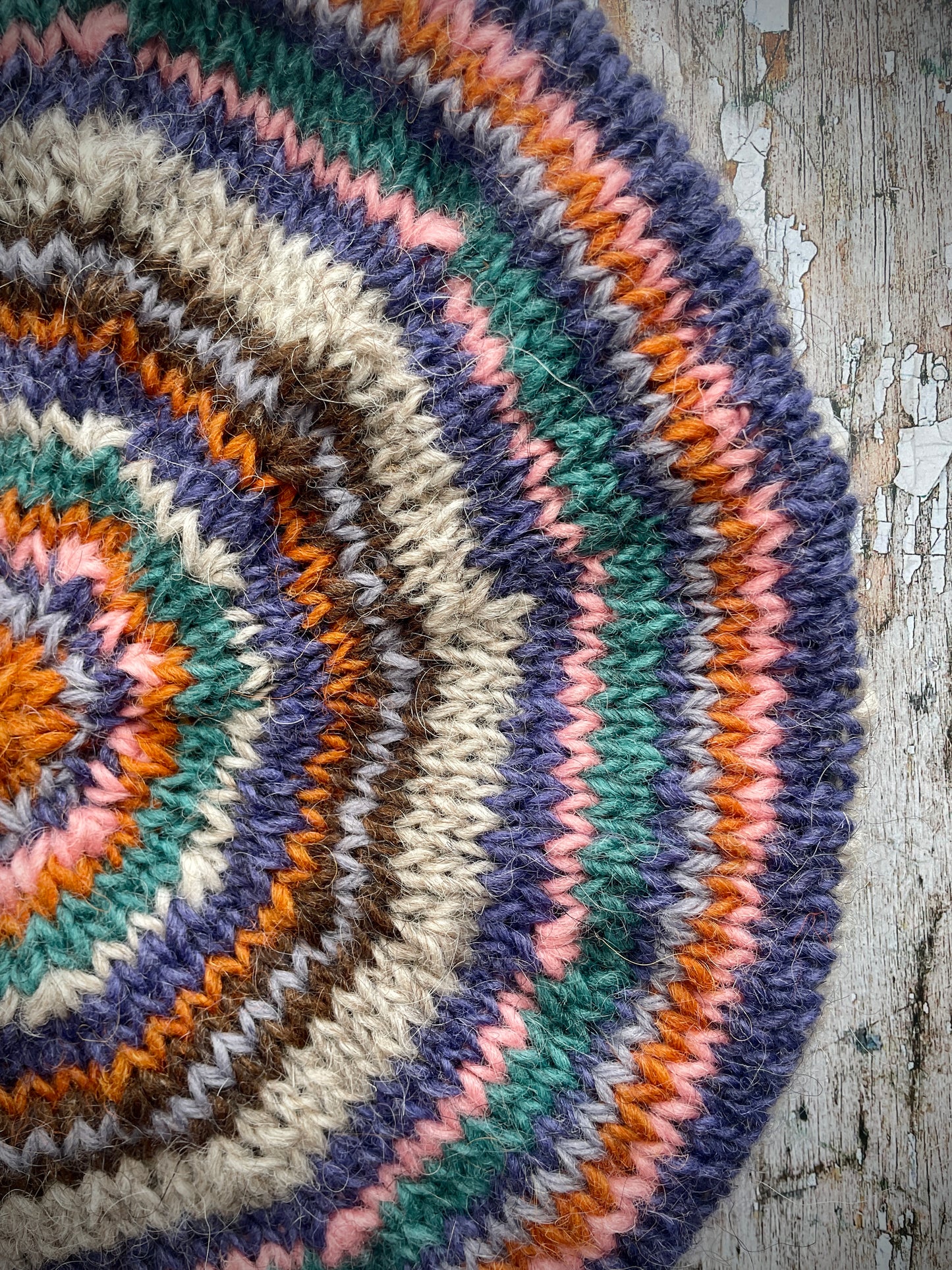 Beautifully hand knitted beret in Icelandic wool, perfect for keeping your head warm on cold days and adding a touch of 40's style to any outfit. Knitted in oat, viridian, violet, dark chocolate, mauve, pink and orange stripes, with an oat ribbed band that gives the hat a snug fit.
SIZE: adult.
CARE: hand wash or machine wash on wool cycle at 30 degrees, dry flat, do not tumble dry.