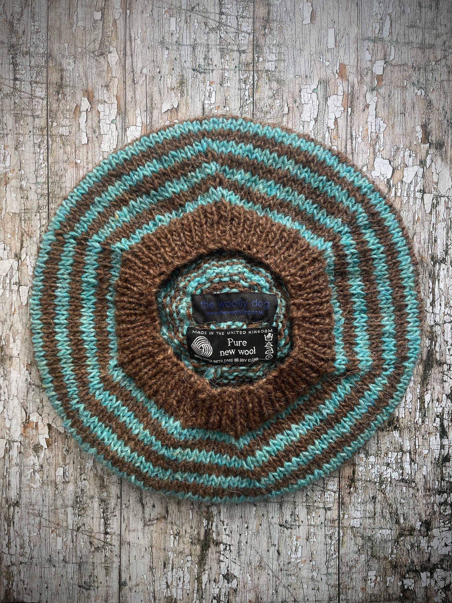 Milk Chocolate + Aqua Breton Stripes Wool Beret
Nautical style beret, beautifully hand knitted with Lettlopi pure new wool, in Breton stripes of milk chocolate and aqua with a big milk chocolate pom and a milk chocolate ribbed band that gives the hat a snug fit. Perfect for keeping your head warm on cold days.
SIZE: adult.
CARE: hand wash or machine wash on wool cycle at 30 degrees, dry flat, do not tumble dry.