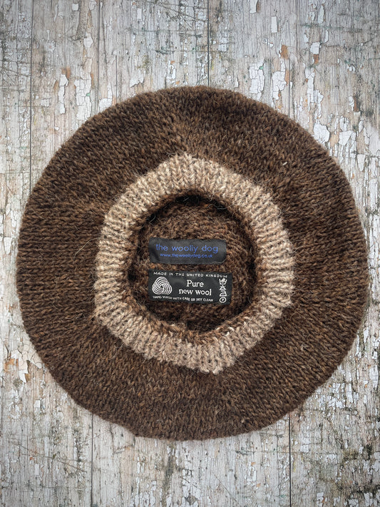 Hand Knitted Wool Beret Dark Chocolate + Dark Oat
Beautifully hand knitted beret in Icelandic pure wool, perfect for keeping your head warm on cold days. Knitted in a lovely dark chocolate brown colour with a dark oat pom and ribbed band that gives the hat a snug fit.
SIZE: adult.
DIAMETER: 11+1/2" / 29cm.
CARE: hand wash or machine wash on wool cycle at 30 degrees, dry flat, do not tumble dry.