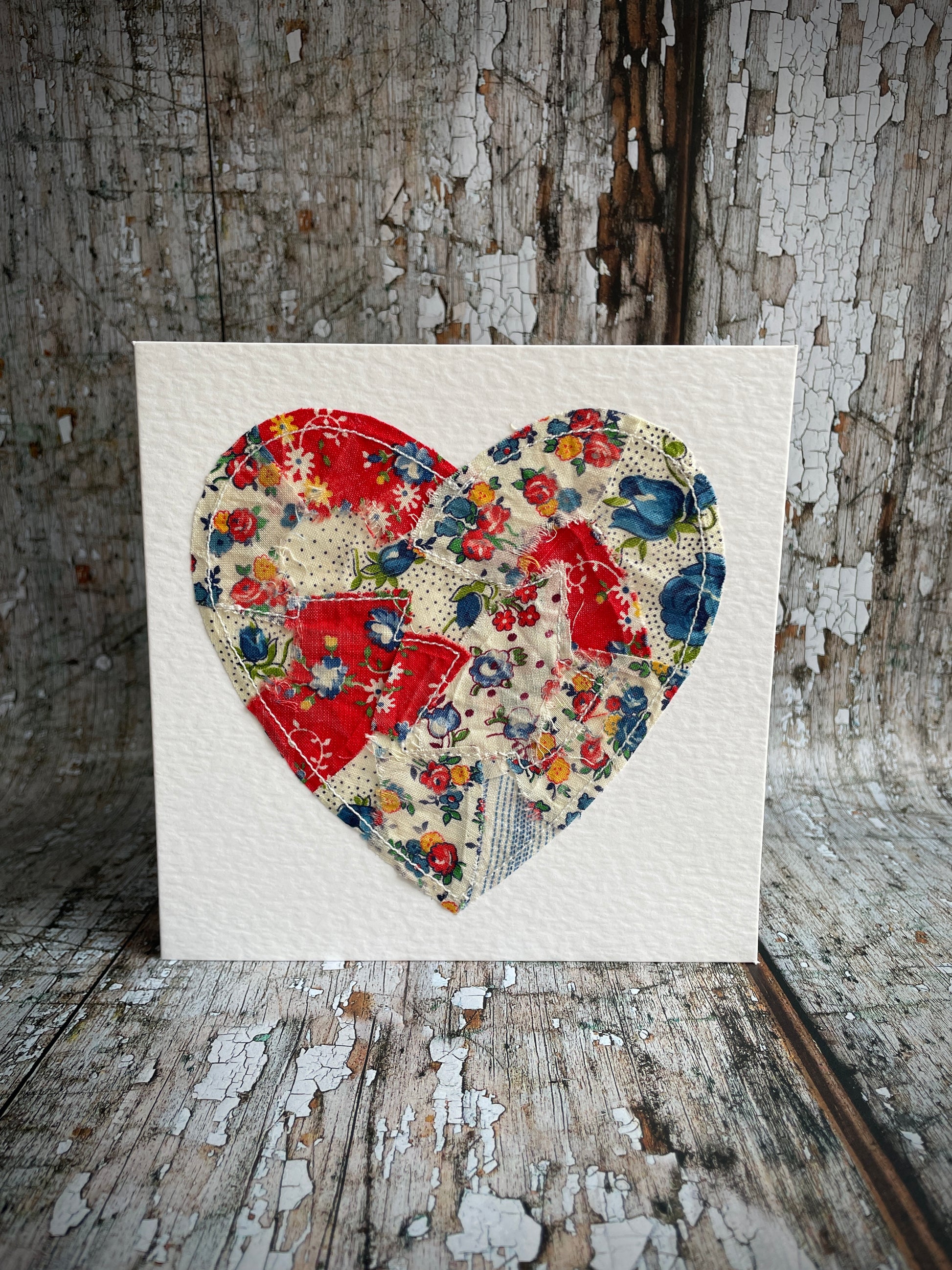 Vintage Feed Sack Card no.18

A beautifully made one of a kind greeting card suitable for any occasion, or just to frame. The heart has been made by carefully patching together sections of genuine vintage feed sack fabrics from the 30's - 50's, on good quality white 225 gsm hammered card, with a simple white envelope in a cello bag. The back of the card is printed with the history of American feed sack fabrics, and the inside left blank for your own special message.

Size: 6" x 6" / 15cm x 15cm