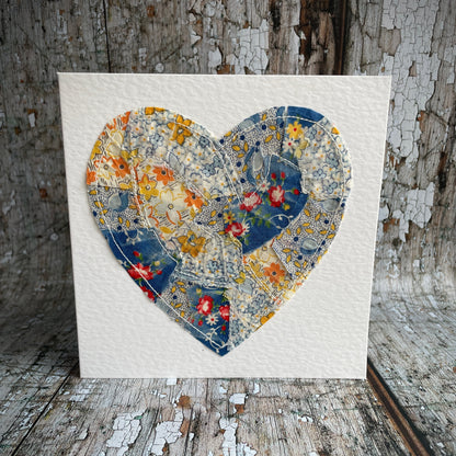 Vintage Feed Sack Card no.19

A beautifully made one of a kind greeting card suitable for any occasion, or just to frame. The heart has been made by carefully patching together sections of genuine vintage feed sack fabrics from the 30's - 50's, on good quality white 225 gsm hammered card, with a simple white envelope in a cello bag. The back of the card is printed with the history of American feed sack fabrics, and the inside left blank for your own special message.

Size: 6" x 6" / 15cm x 15cm