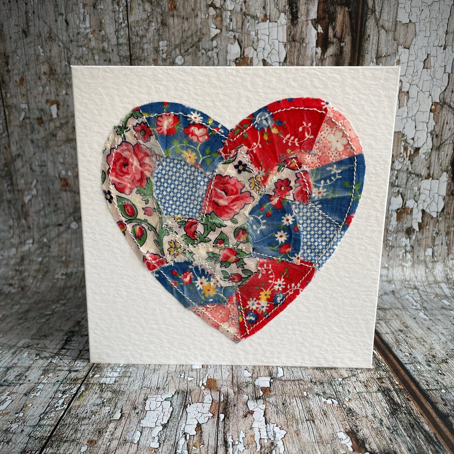 Vintage Feed Sack Card no.21

A beautifully made one of a kind greeting card suitable for any occasion, or just to frame. The heart has been made by carefully patching together sections of genuine vintage feed sack fabrics from the 30's - 50's, on good quality white 225 gsm hammered card, with a simple white envelope in a cello bag. The back of the card is printed with the history of American feed sack fabrics, and the inside left blank for your own special message.

Size: 6" x 6" / 15cm x 15cm