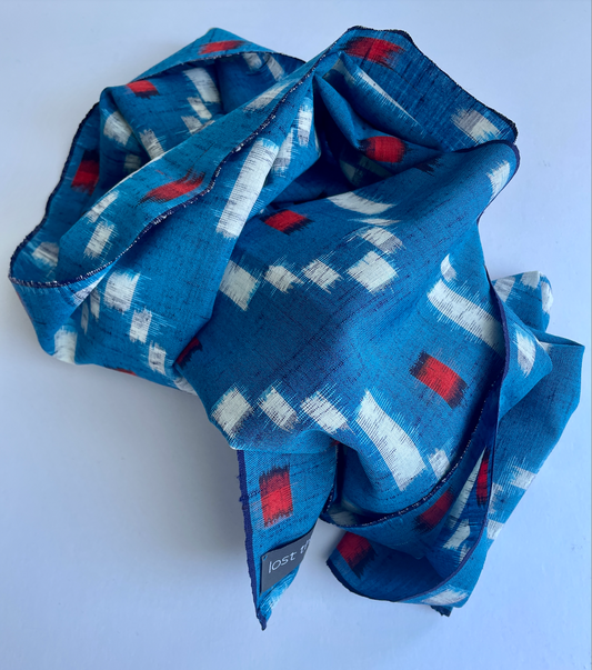 Antique Japanese Kusakizome Fabric Scarf&nbsp;

This long, medium weight, brightly patterned linen and wool scarf, has been made from antique Japanese woven Kusakizome fabric, which was originally used for making kimonos. The blue colour is a mixture of two indigo dyes and the beautiful red colour was produced by eco friendly botanical dying known as Kusakizome. The ends have been hand hemmed.