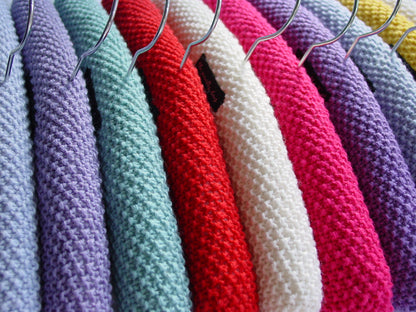 Children's Padded Hand Knitted Wool Hanger In Dark Aqua
