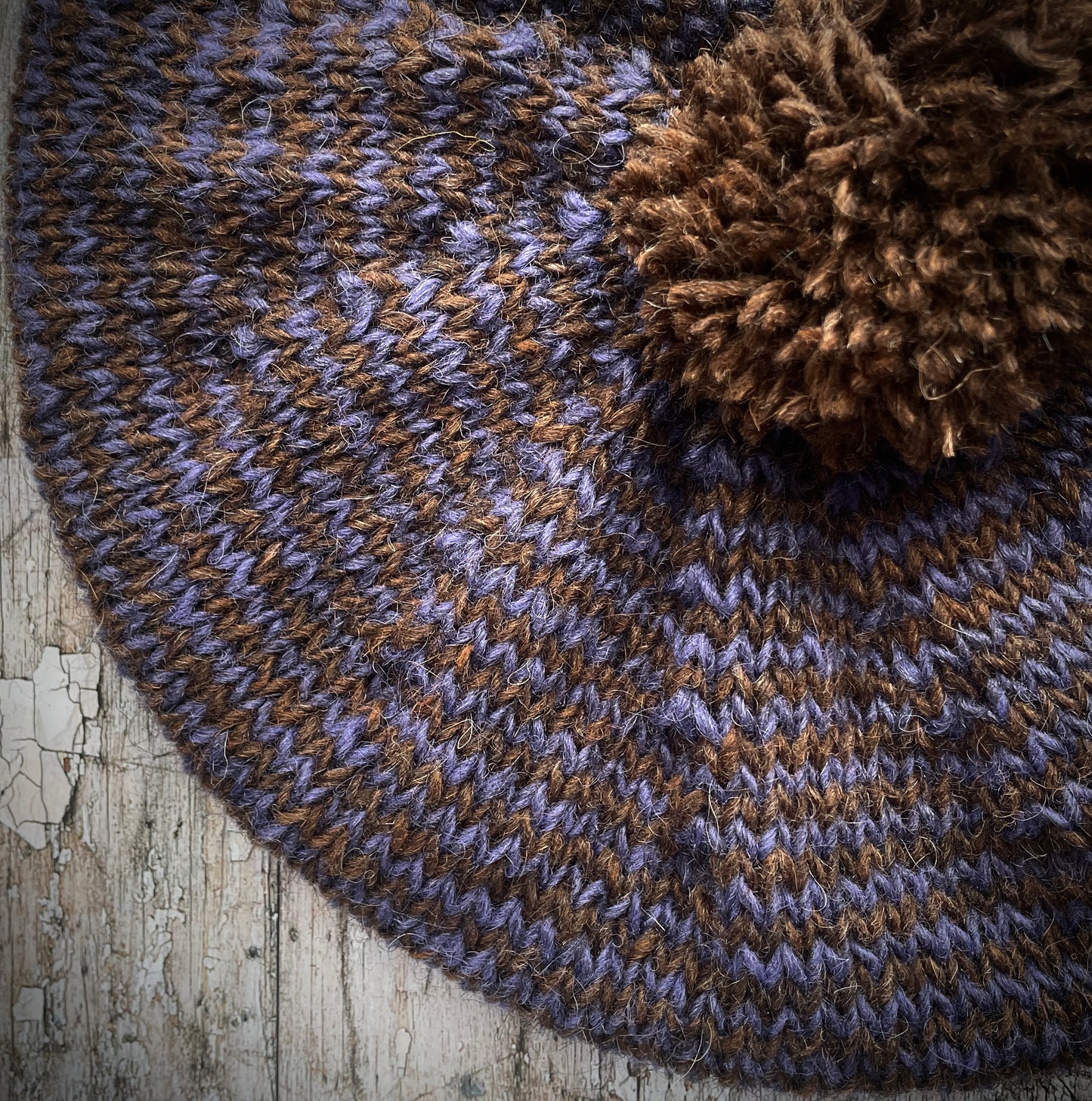 Dark Chocolate + Lavender Striped Wool Beret

Beautifully hand knitted with Lettlopi pure new wool, in half plain dark chocolate brown and half lavender stripes, with a big chocolate brown pom and a ribbed band that gives the hat a snug fit. Perfect for keeping your head warm on cold days.

SIZE: adult.

CARE: hand wash or machine wash on wool cycle at 30 degrees, dry flat, do not tumble dry.