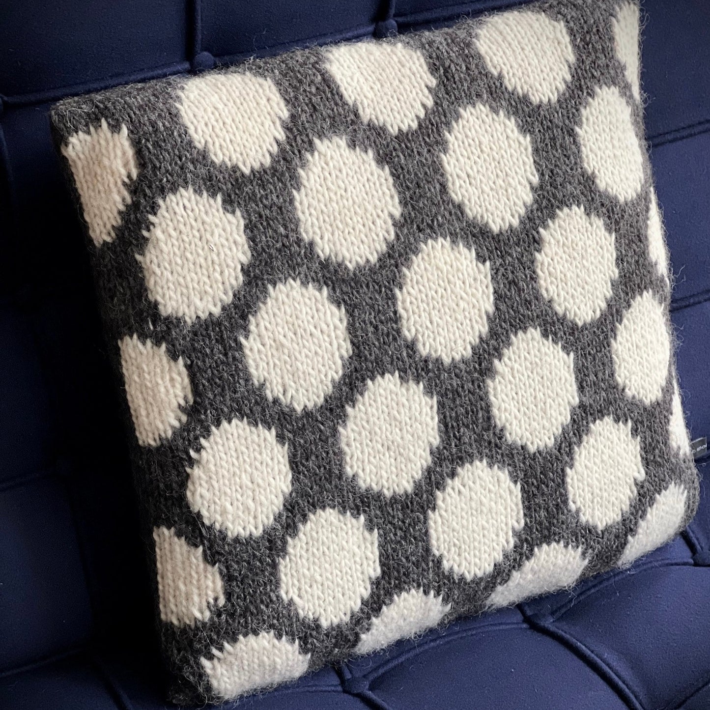 Hand Knitted Wool Cushion Cream Spots On Grey Tweed