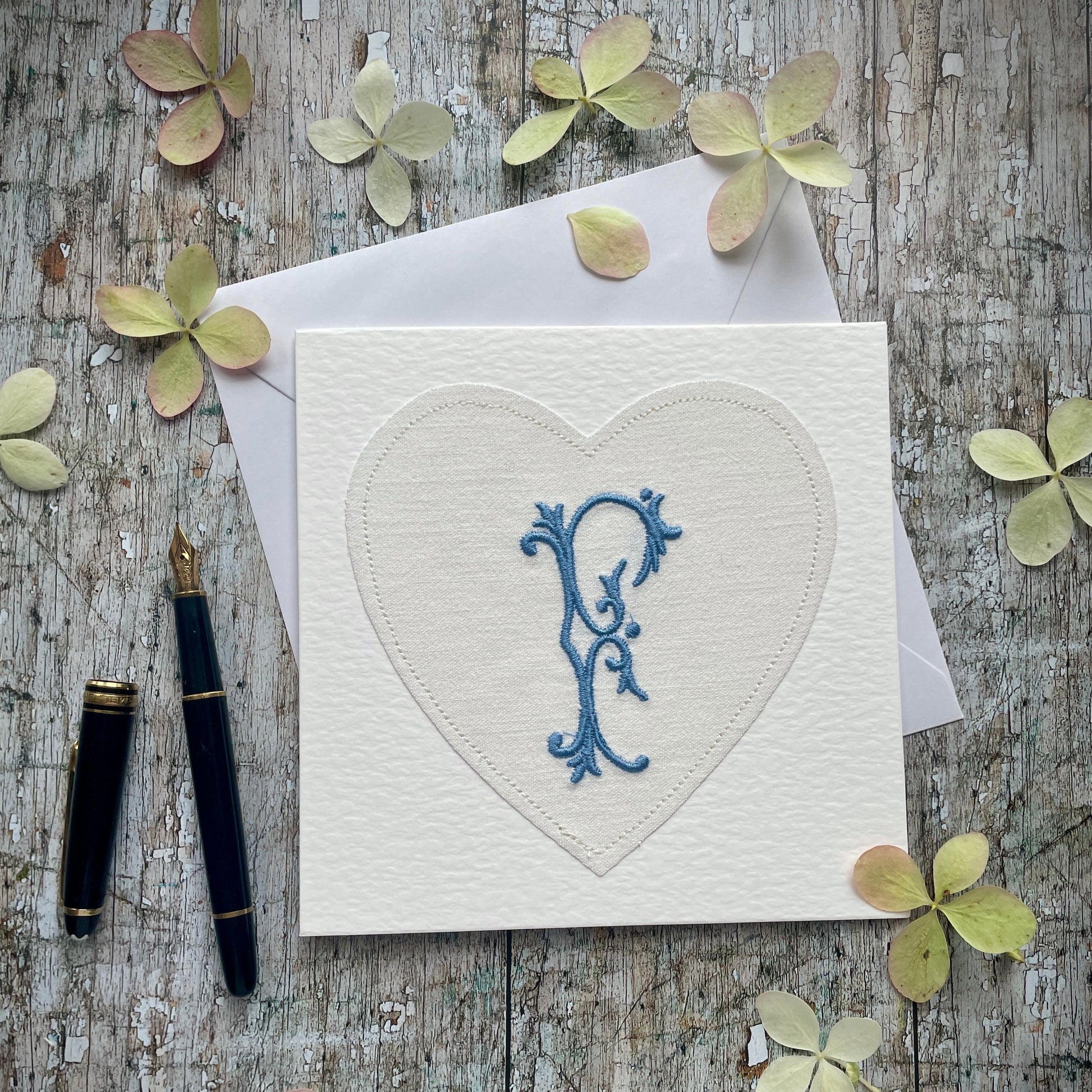 Embroidered Initial Card Blue F

Beautifully made one of a kind romantic card suitable for any occasion, or just to frame. The initial F has been embroidered with blue colour thread onto a piece of heart shaped vintage linen, then sewn onto a good quality acid free white 225 gsm hammered card, the inside left blank for your own special message. It comes with a simple white envelope in a cello bag.

Size: 6" x 6" / 15cm x 15cm