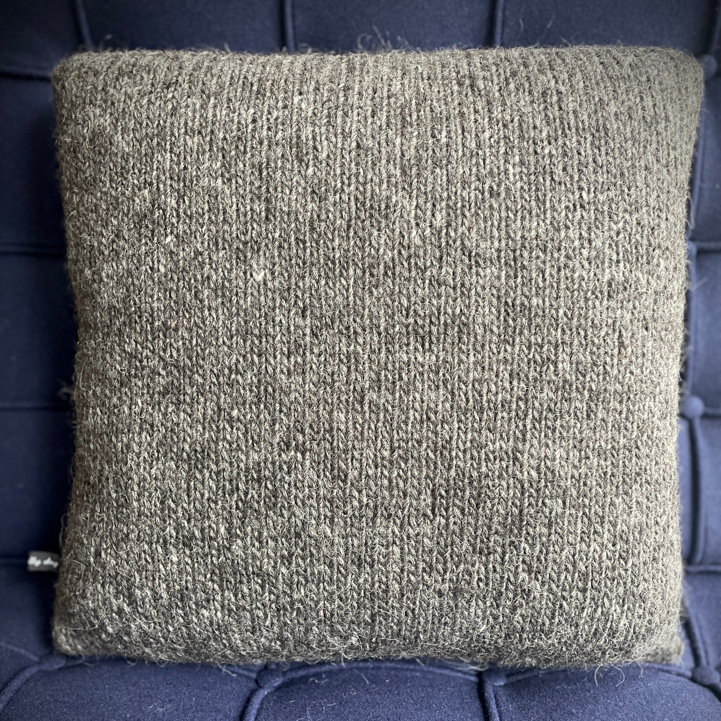 Hand Knitted Wool Cushion Cream Spots On Grey Tweed