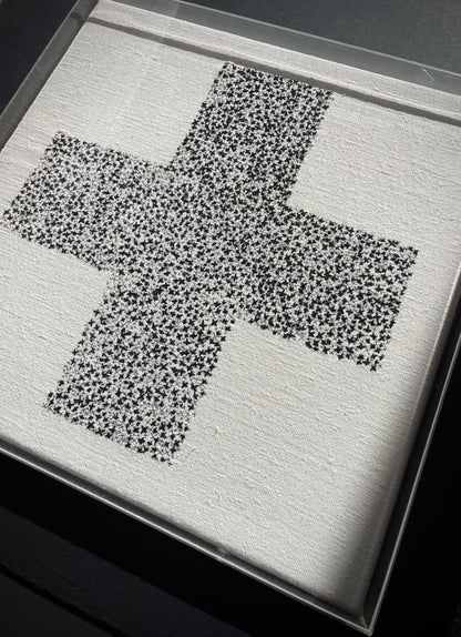Framed Embroidered Cross In Acrylic Tray
This is a one of a kind hand embroidered artwork, made by stitching hundreds of different sized crosses, with 3 different thicknesses of black linen and cotton thread, onto a beautiful vintage French slubbed linen.
The artwork was stretched over a wooden frame, then covered with a bespoke 3mm clear cast Acrylic tray, the back is open and strung ready to hang.
Size of frame approximately: 40.5 cm square / 16" square.
Depth of frame approximately: 4.5 cm / 3+1/4".