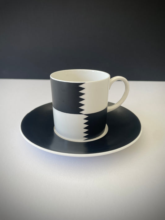 VINTAGE SUSIE COOPER HERALDRY CUP AND SAUCER
Vintage Susie Cooper coffee cup and saucer in the black and white 'Heraldry' pattern, her design for Wedgwood between 1960 - 1969. Made in Bone China, a porcelain that's lighter, more delicate and translucent compared to standard porcelain.
In beautiful condition with no cracks or chips.
Perfect to display or use as a photo prop.
Width of saucer: 14 cm / 5+1/2"
Height of cup: 6.5 cm / 2+1/2"
Width of cup: 6.5 cm / 2+1/2"
