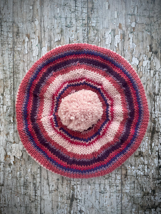 Children's 40's Style Beret 6 - 24 Months Style D

Beautifully hand knitted beret in Rowan and Yarn Stories pure wool, perfect for keeping little heads warm on cold days. Knitted in faun, mauve, pale blue, red, white and yellow stripes with a big red pom and a faun ribbed band that gives the hat a snug fit, it would look stunning on boys or girls.

SIZE: child 6 - 24 months Diameter 27 cm / 10+1/2".