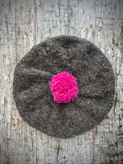 Hand Knitted Wool Beret Grey Tweed + Bright Pink

Beautifully hand knitted beret in Icelandic pure wool, perfect for keeping your head warm on cold days. Knitted in grey tweed with a bright pink pom and pink ribbed band that gives the hat a snug fit.

SIZE: adult.

CARE: hand wash or machine wash on wool cycle at 30 degrees, dry flat, do not tumble dry.