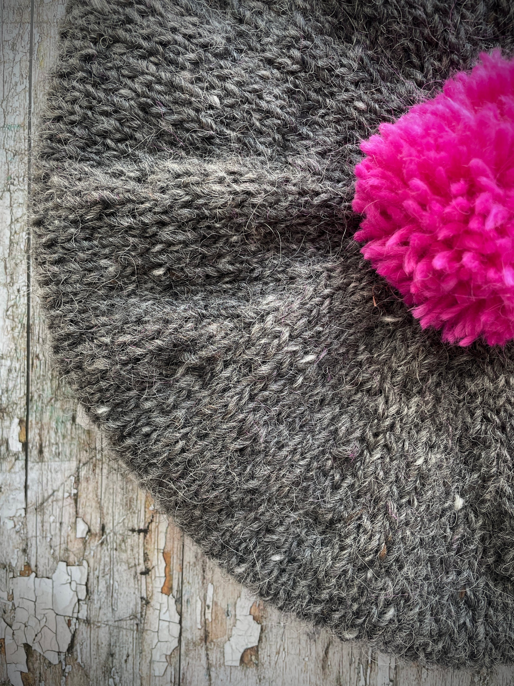 Hand Knitted Wool Beret Grey Tweed + Bright Pink

Beautifully hand knitted beret in Icelandic pure wool, perfect for keeping your head warm on cold days. Knitted in grey tweed with a bright pink pom and pink ribbed band that gives the hat a snug fit.

SIZE: adult.

CARE: hand wash or machine wash on wool cycle at 30 degrees, dry flat, do not tumble dry.