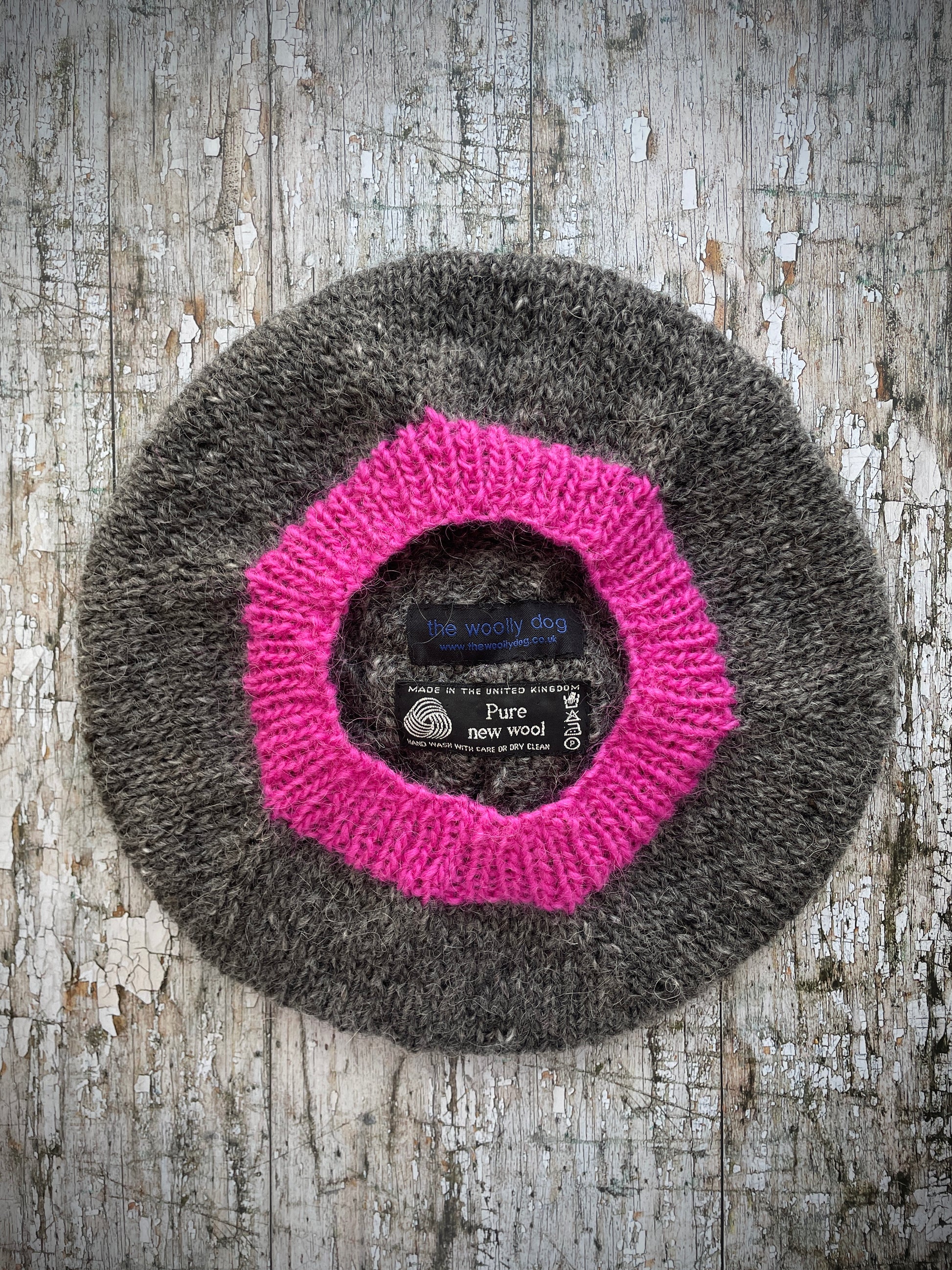 Hand Knitted Wool Beret Grey Tweed + Bright Pink

Beautifully hand knitted beret in Icelandic pure wool, perfect for keeping your head warm on cold days. Knitted in grey tweed with a bright pink pom and pink ribbed band that gives the hat a snug fit.

SIZE: adult.

CARE: hand wash or machine wash on wool cycle at 30 degrees, dry flat, do not tumble dry.
