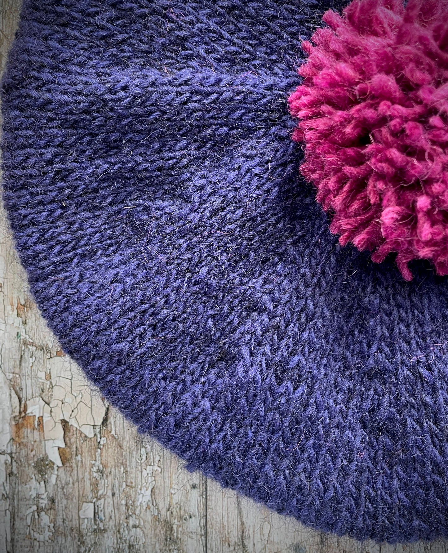 Hand Knitted Wool Dark Royal Blue + Fuchsia Beret

Beautifully hand knitted beret in Icelandic pure wool, perfect for keeping your head warm on cold days. Knitted in a beautiful dark royal blue, a deep, vibrant and rich shade of blue, lighter than navy blue with subtle purple undertones and fuchsia, with a big fuchsia pom and fuchsia ribbed band that gives the hat a snug fit.

SIZE: adult.

CARE: hand wash or machine wash on wool cycle at 30 degrees, dry flat, do not tumble dry.