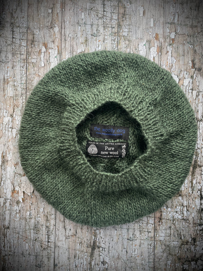 Beautifully hand knitted beret in sage green heather Icelandic wool and a rich yellow BFL wool, perfect for keeping your head warm on cold days, with a ribbed band of sage green that gives the hat a snug fit.

SIZE: Adult.

CARE: hand wash or machine wash on wool cycle at 30 degrees, dry flat, do not tumble dry.