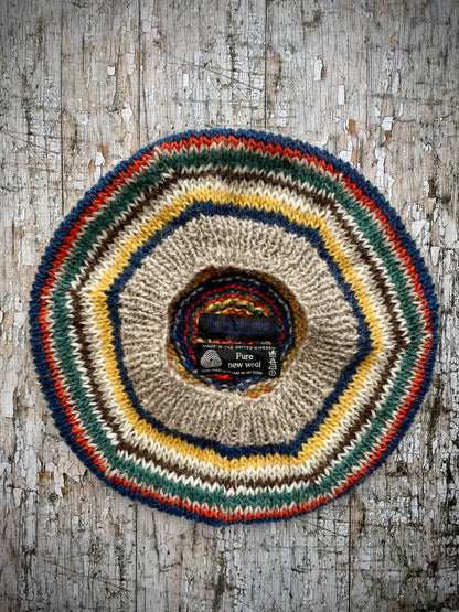 CLASSIC 40's STYLE ADULT'S BERET style 4

Beautifully hand knitted beret in Icelandic pure wool, perfect for keeping your head warm on cold days and adding a touch of 40's style to any outfit. Knitted in oat, bright blue, yellow, white, dark chocolate brown, viridian and orange stripes, with an oat ribbed band that gives the hat a snug fit.

ONE SIZE: adult.
CARE: hand wash or machine wash on wool cycle at 30 degrees, dry flat, do not tumble dry.