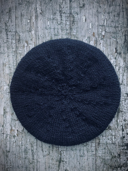 Large Hand Knitted Wool Beret Dark Navy Blue

Beautifully hand knitted slouchy beret in Icelandic pure wool, perfect for keeping your head warm on cold days, knitted in a dark navy blue colour, with a ribbed band that gives the hat a snug fit.

SIZE: LARGE.

CARE: hand wash or machine wash on wool cycle at 30 degrees, dry flat, do not tumble dry.