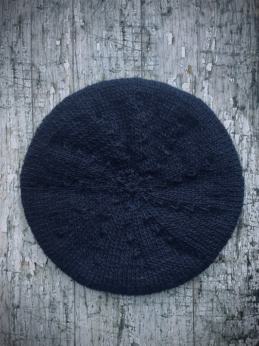 Large Hand Knitted Wool Beret Dark Navy Blue

Beautifully hand knitted slouchy beret in Icelandic pure wool, perfect for keeping your head warm on cold days, knitted in a dark navy blue colour, with a ribbed band that gives the hat a snug fit.

SIZE: LARGE.

CARE: hand wash or machine wash on wool cycle at 30 degrees, dry flat, do not tumble dry.