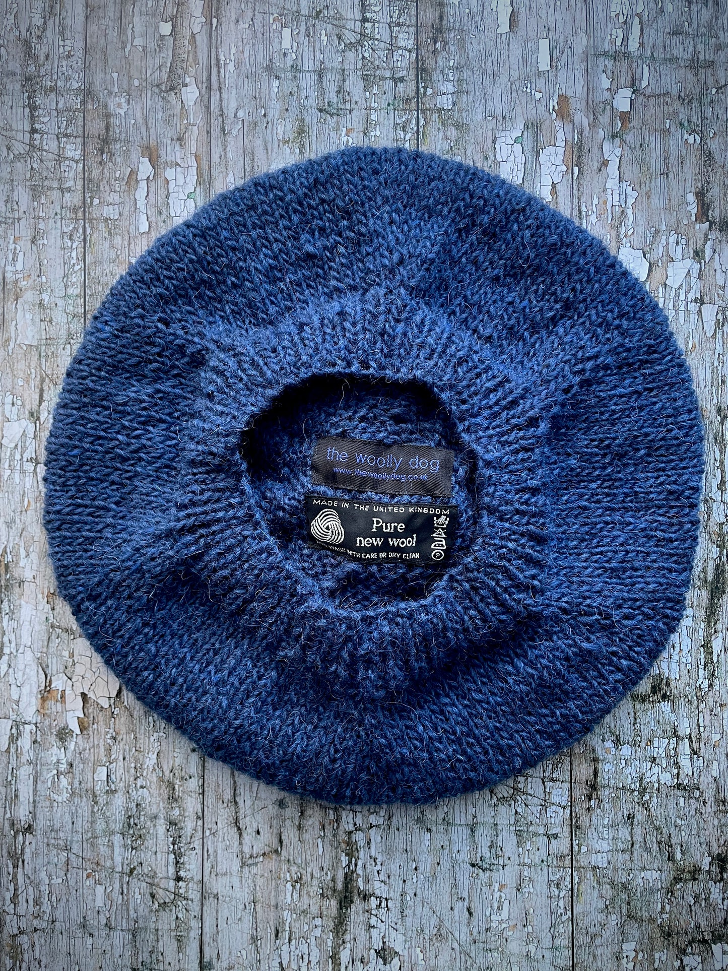 Hand Knitted Wool Indigo + Fuchsia Beret

Beautifully hand knitted beret in Icelandic pure wool, perfect for keeping your head warm on cold days. Knitted in a beautiful indigo blue, with a big fuchsia pom and indigo ribbed band that gives the hat a snug fit.

SIZE: adult.

CARE: hand wash or machine wash on wool cycle at 30 degrees, dry flat, do not tumble dry.