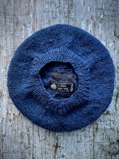 Hand Knitted Wool Indigo + Fuchsia Beret

Beautifully hand knitted beret in Icelandic pure wool, perfect for keeping your head warm on cold days. Knitted in a beautiful indigo blue, with a big fuchsia pom and indigo ribbed band that gives the hat a snug fit.

SIZE: adult.

CARE: hand wash or machine wash on wool cycle at 30 degrees, dry flat, do not tumble dry.