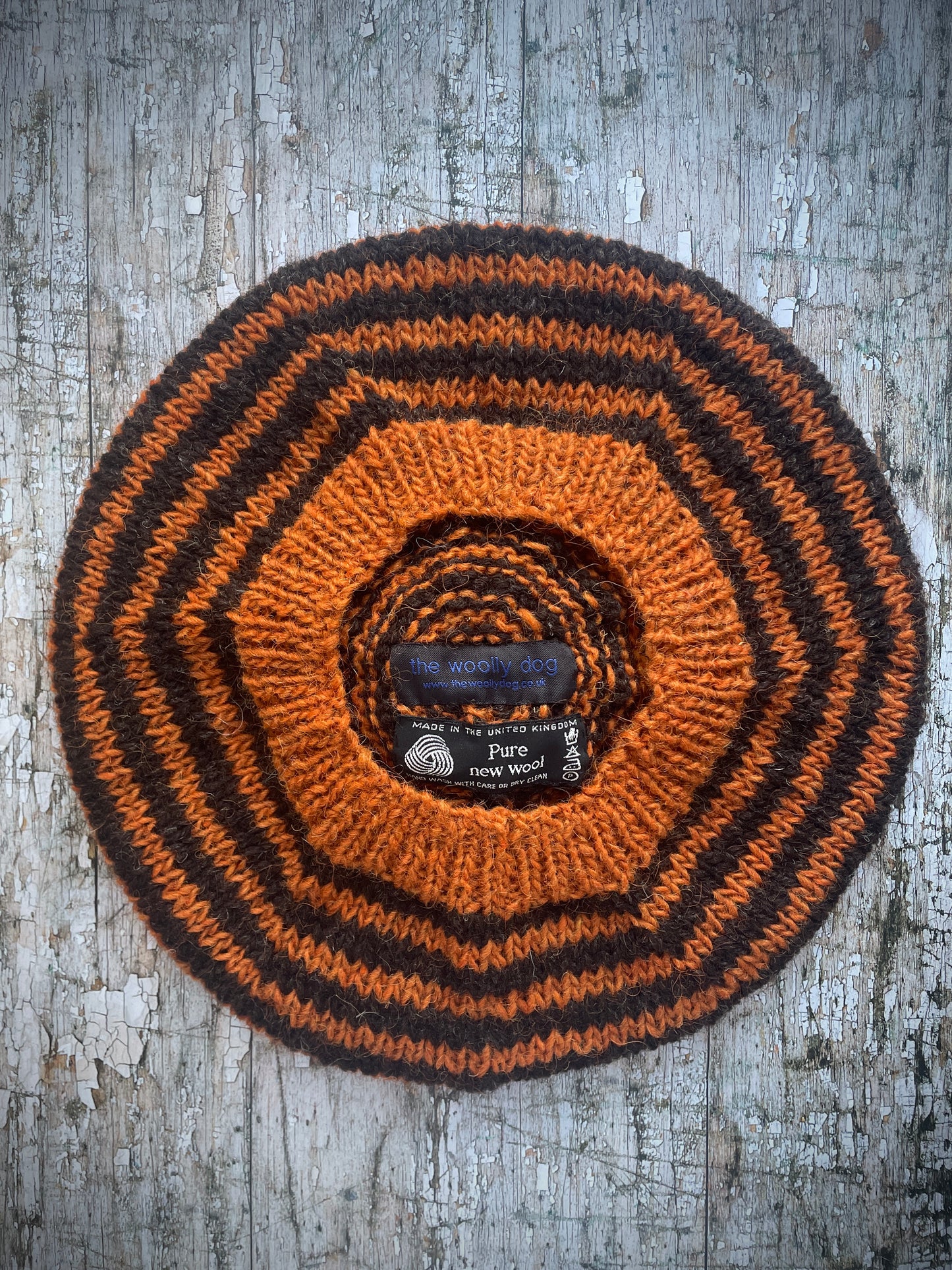 Ginger + Dark Chocolate Breton Stripes Wool Beret

Nautical style beret, beautifully hand knitted with Lettlopi pure new wool, in Breton stripes of ginger and dark chocolate with a big ginger pom and a ginger ribbed band that gives the hat a snug fit. Perfect for keeping your head warm on cold days.

SIZE: adult.

CARE: hand wash or machine wash on wool cycle at 30 degrees, dry flat, do not tumble dry.