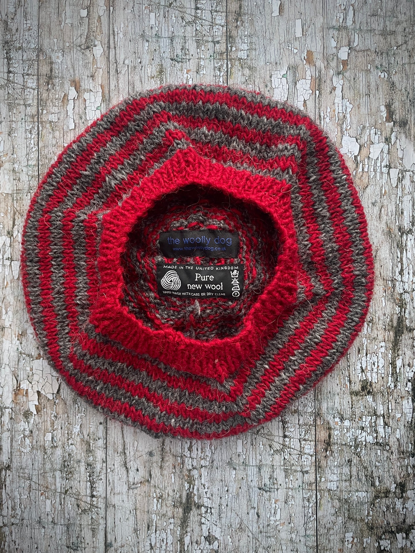 Red + Grey Breton Stripes Wool Beret

Nautical style beret, beautifully hand knitted with Icelandic pure new wool, in Breton stripes of red and grey with a big red pom&nbsp;and a red ribbed band that gives the hat a snug fit. Perfect for keeping your head warm on cold days.

SIZE: adult.

CARE: hand wash or machine wash on wool cycle at 30 degrees, dry flat, do not tumble dry.