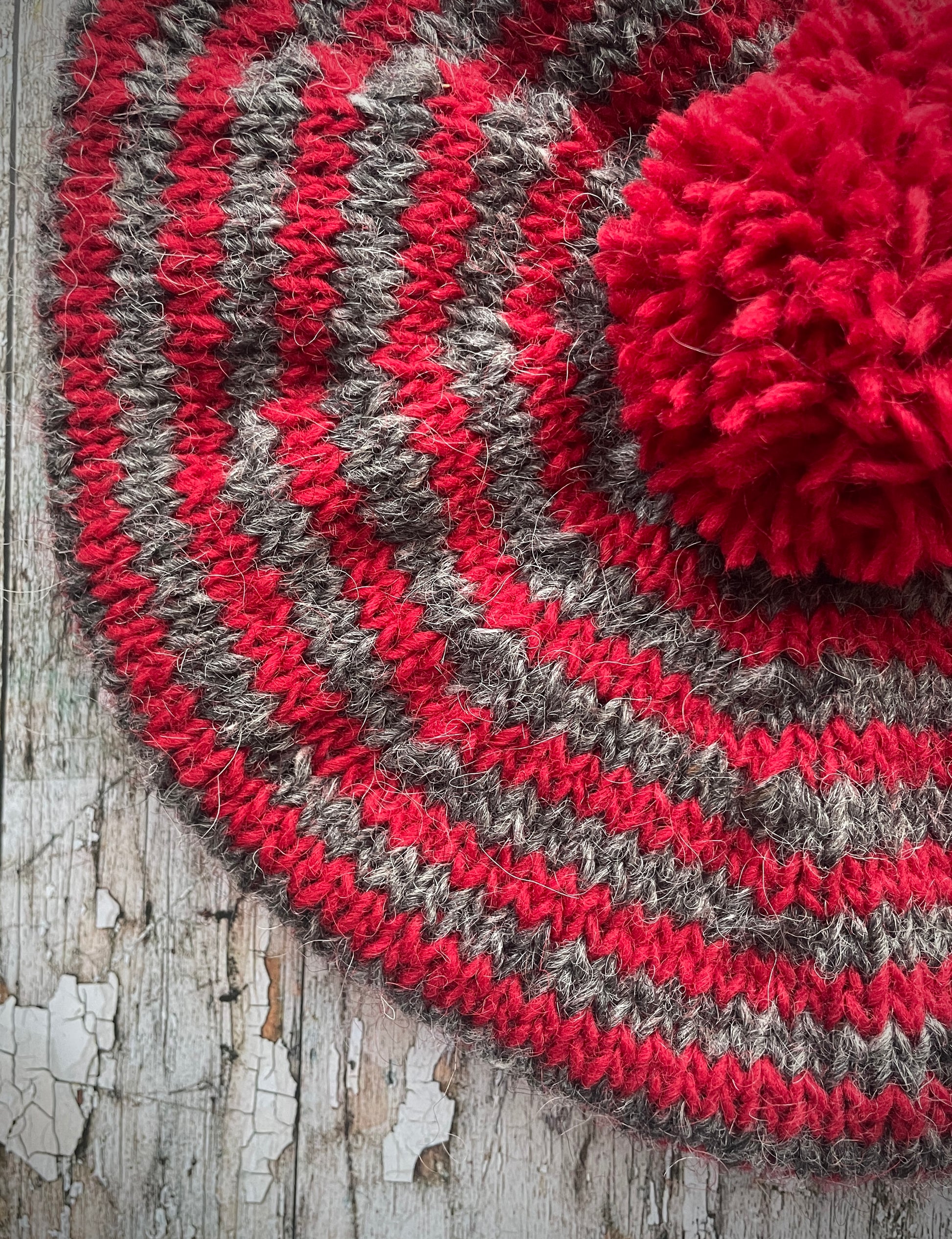 Red + Grey Breton Stripes Wool Beret

Nautical style beret, beautifully hand knitted with Icelandic pure new wool, in Breton stripes of red and grey with a big red pom&nbsp;and a red ribbed band that gives the hat a snug fit. Perfect for keeping your head warm on cold days.

SIZE: adult.

CARE: hand wash or machine wash on wool cycle at 30 degrees, dry flat, do not tumble dry.
