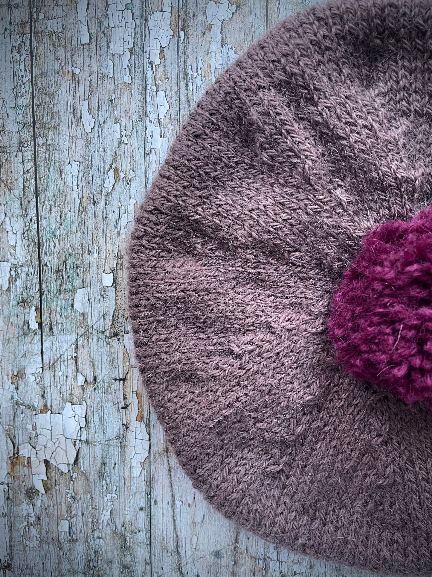 Hand Knitted Wool Beret In Umber + Mulberry

Beautifully hand knitted beret with West Yorkshire Spinners wool, alpaca and mohair in an umber colour, perfect for keeping your head warm on cold days, with a big pom and ribbed band that gives the hat a snug fit in a mix of Rowan wool and mohair in mulberry

SIZE: adult.

CARE: hand wash or machine wash on wool cycle at 30 degrees, dry flat, do not tumble dry.