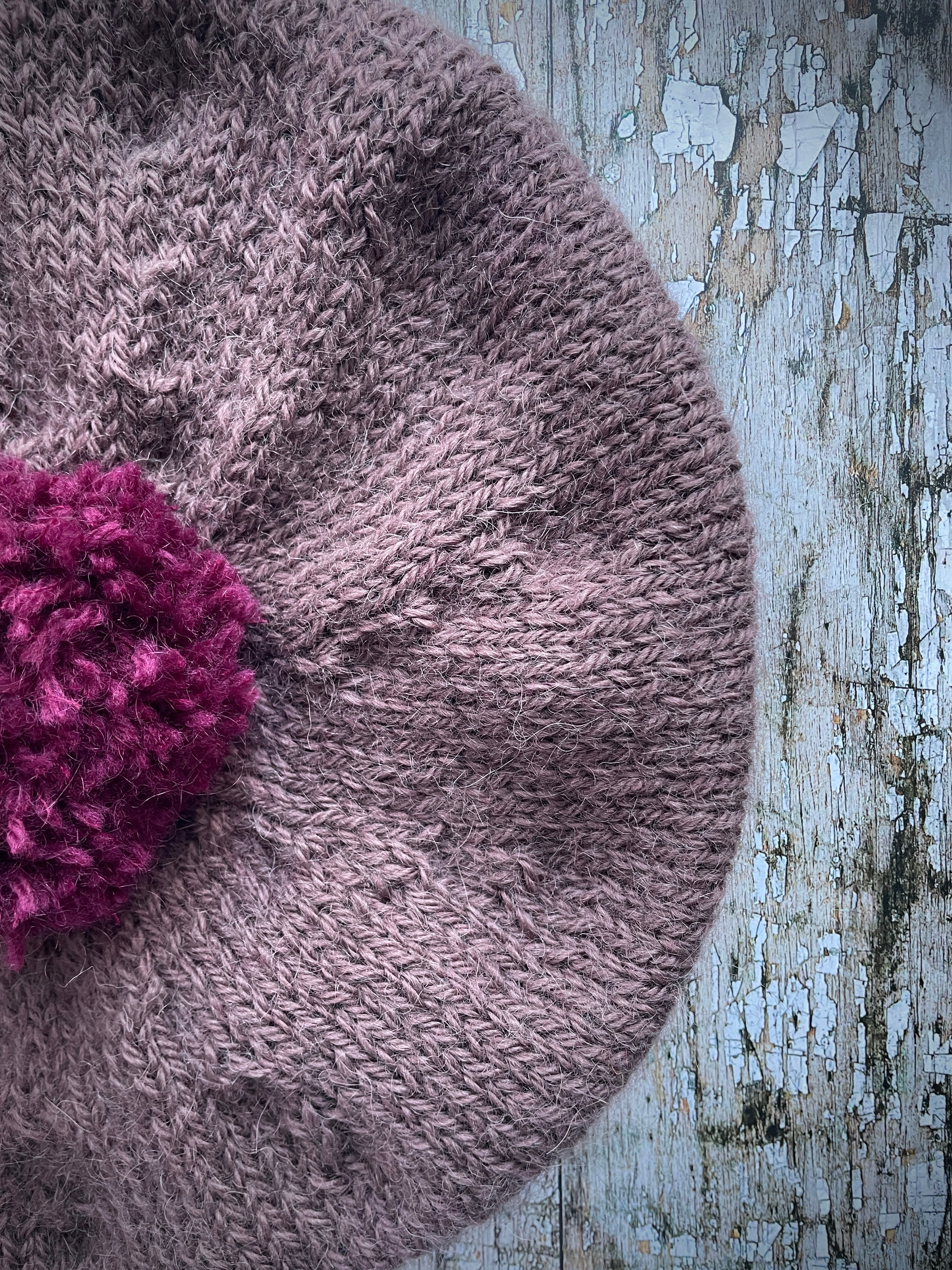 Hand Knitted Wool Beret In Umber + Mulberry

Beautifully hand knitted beret with West Yorkshire Spinners wool, alpaca and mohair in an umber colour, perfect for keeping your head warm on cold days, with a big pom and ribbed band that gives the hat a snug fit in a mix of Rowan wool and mohair in mulberry

SIZE: adult.

CARE: hand wash or machine wash on wool cycle at 30 degrees, dry flat, do not tumble dry.