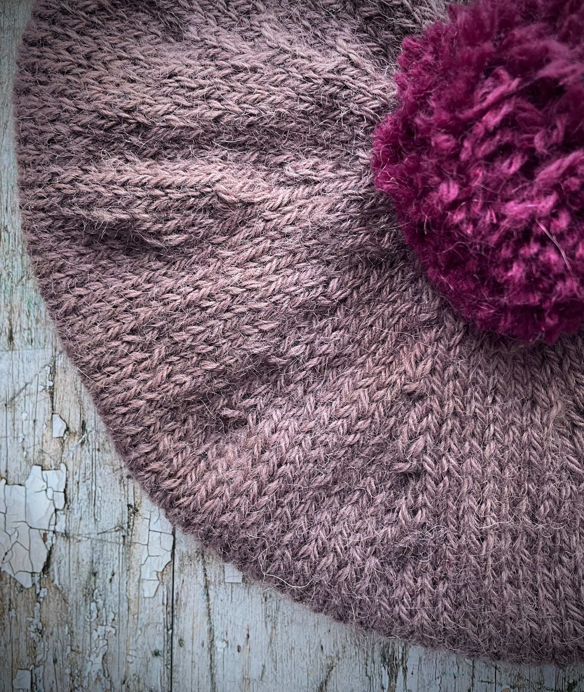 Hand Knitted Wool Beret In Umber + Mulberry

Beautifully hand knitted beret with West Yorkshire Spinners wool, alpaca and mohair in an umber colour, perfect for keeping your head warm on cold days, with a big pom and ribbed band that gives the hat a snug fit in a mix of Rowan wool and mohair in mulberry

SIZE: adult.

CARE: hand wash or machine wash on wool cycle at 30 degrees, dry flat, do not tumble dry.