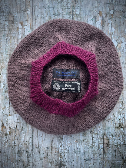 Hand Knitted Wool Beret In Umber + Mulberry

Beautifully hand knitted beret with West Yorkshire Spinners wool, alpaca and mohair in an umber colour, perfect for keeping your head warm on cold days, with a big pom and ribbed band that gives the hat a snug fit in a mix of Rowan wool and mohair in mulberry

SIZE: adult.

CARE: hand wash or machine wash on wool cycle at 30 degrees, dry flat, do not tumble dry.