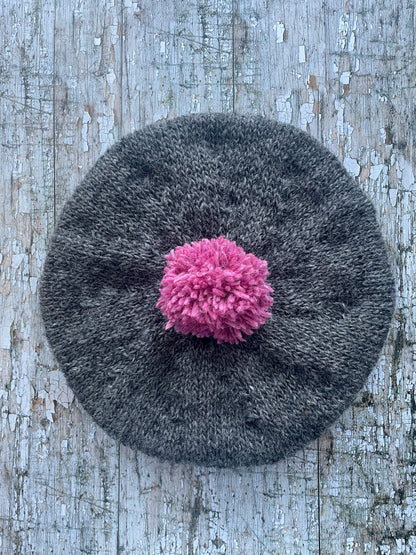 Hand Knitted Wool Beret Grey Tweed + Pink Heather

Beautifully hand knitted beret in Icelandic pure wool, perfect for keeping your head warm on cold days. Knitted in a grey tweed, with a big pink pom and pink ribbed band that gives the hat a snug fit.

SIZE: adult.

CARE: hand wash or machine wash on wool cycle at 30 degrees, dry flat, do not tumble dry.