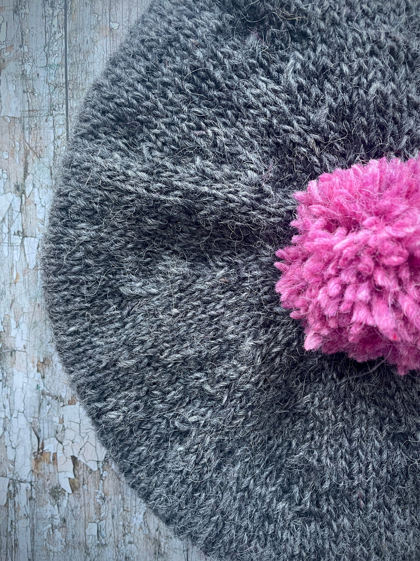 Hand Knitted Wool Beret Grey Tweed + Pink Heather

Beautifully hand knitted beret in Icelandic pure wool, perfect for keeping your head warm on cold days. Knitted in a grey tweed, with a big pink pom and pink ribbed band that gives the hat a snug fit.

SIZE: adult.

CARE: hand wash or machine wash on wool cycle at 30 degrees, dry flat, do not tumble dry.