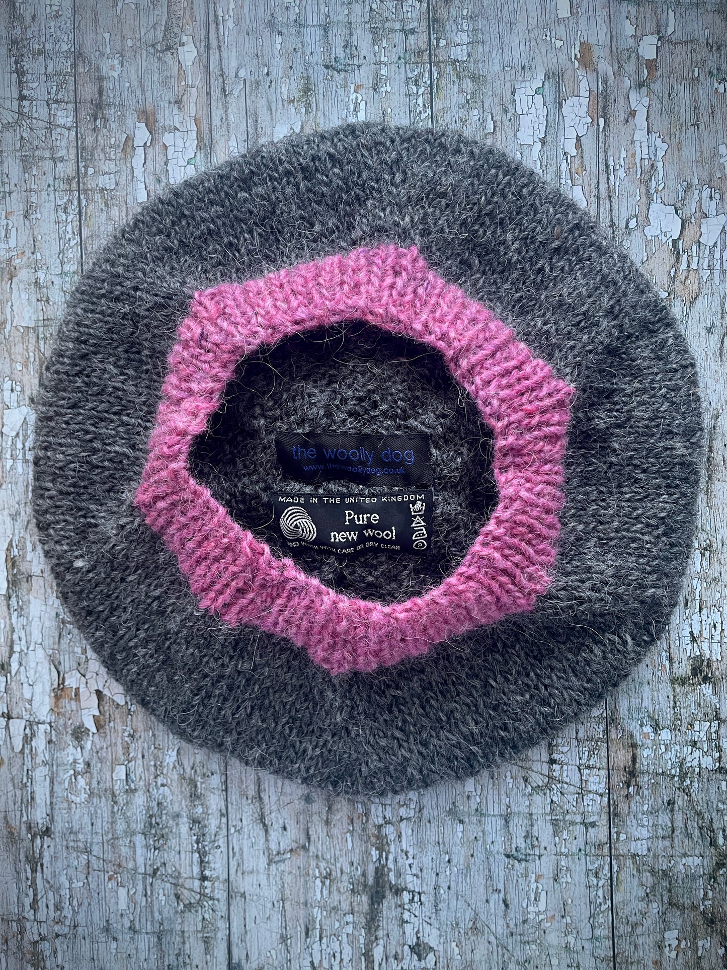 Hand Knitted Wool Beret Grey Tweed + Pink Heather

Beautifully hand knitted beret in Icelandic pure wool, perfect for keeping your head warm on cold days. Knitted in a grey tweed, with a big pink pom and pink ribbed band that gives the hat a snug fit.

SIZE: adult.

CARE: hand wash or machine wash on wool cycle at 30 degrees, dry flat, do not tumble dry.