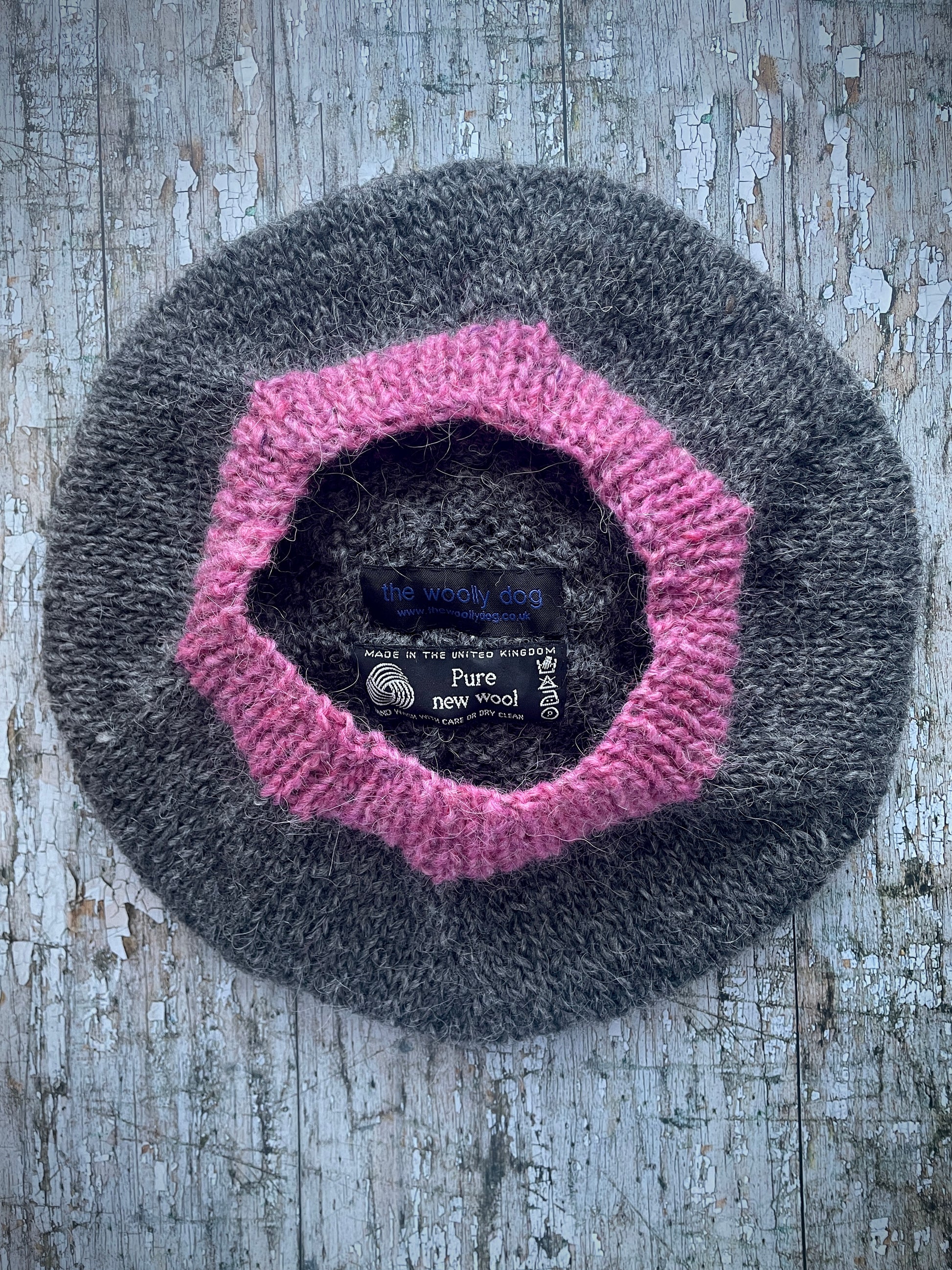Hand Knitted Wool Beret Grey Tweed + Pink Heather

Beautifully hand knitted beret in Icelandic pure wool, perfect for keeping your head warm on cold days. Knitted in a grey tweed, with a big pink pom and pink ribbed band that gives the hat a snug fit.

SIZE: adult.

CARE: hand wash or machine wash on wool cycle at 30 degrees, dry flat, do not tumble dry.
