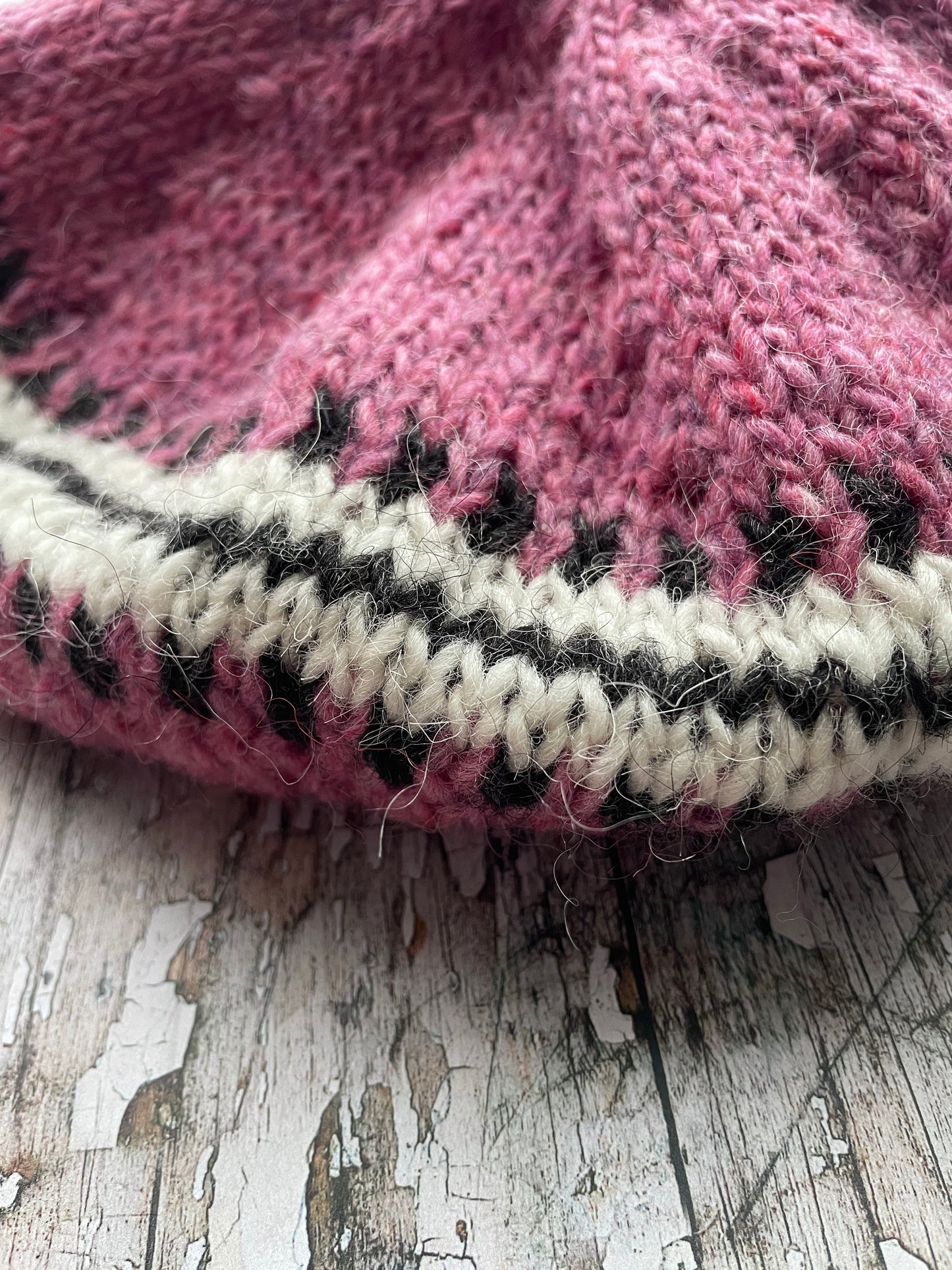 Hand Knitted Wool Beret Pink Heather

Beautifully hand knitted beret in Icelandic pure wool, perfect for keeping your head warm on cold days, knitted in a pink heather, with a&nbsp; pattern of graphite and white and a ribbed band that gives the hat a snug fit.&nbsp;

SIZE: adult.

DIAMETER: 11+3/4" / 30cm.

CARE: hand wash or machine wash on wool cycle at 30 degrees, dry flat, do not tumble dry.