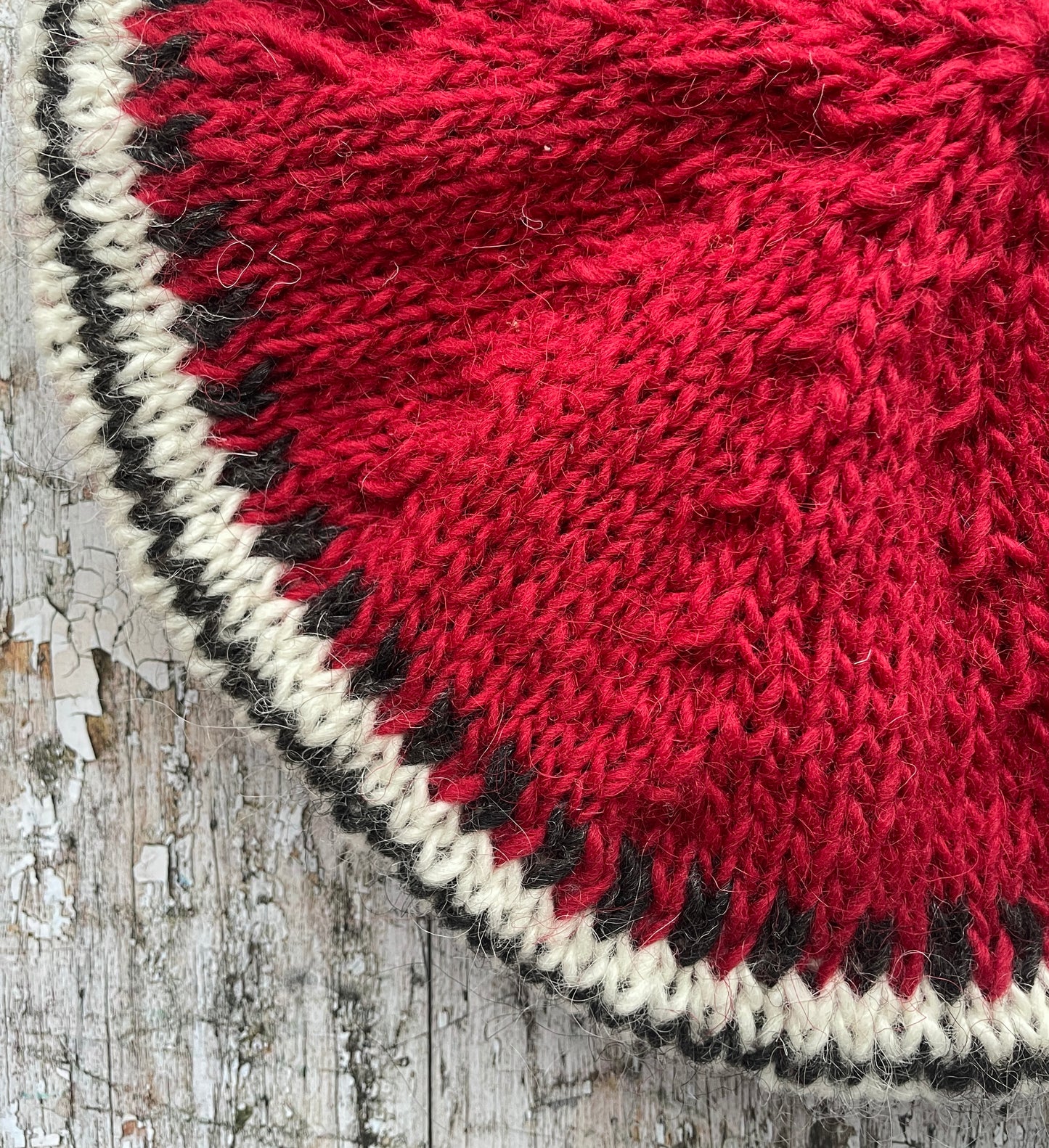 Hand Knitted Wool Beret Red

Beautifully hand knitted beret in Icelandic pure wool, perfect for keeping your head warm on cold days, knitted in red, with a&nbsp; pattern of graphite and white and a ribbed band that gives the hat a snug fit.&nbsp;

SIZE: adult.

DIAMETER: 11+3/4" / 30cm.

CARE: hand wash or machine wash on wool cycle at 30 degrees, dry flat, do not tumble dry.