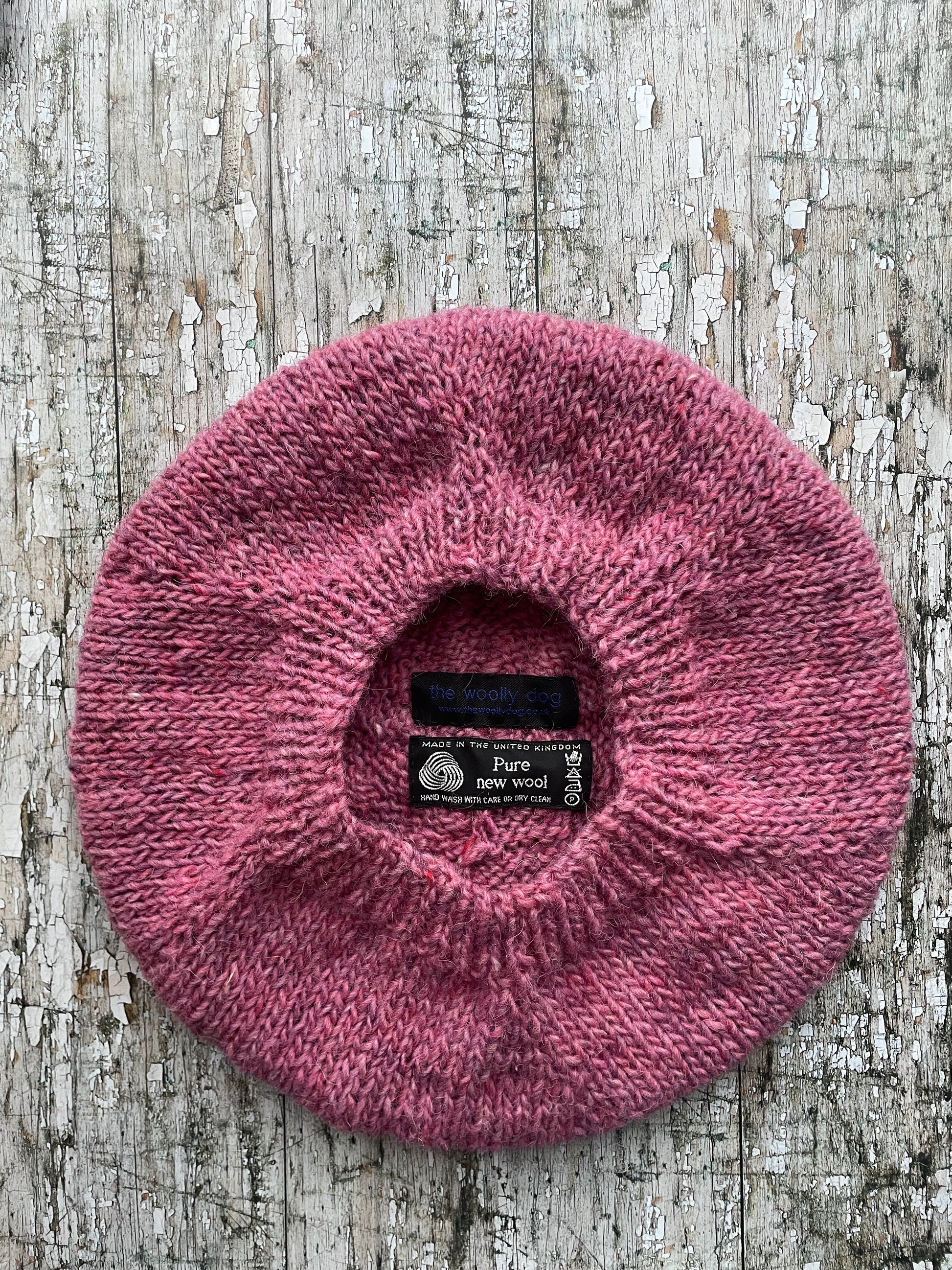 Hand Knitted Wool Beret Pink Heather

Beautifully hand knitted beret in Icelandic pure wool, perfect for keeping your head warm on cold days, knitted in a lovely pink heather colour, with a ribbed band that gives the hat a snug fit.

SIZE: adult.

DIAMETER: 11+1/4" / 28.5cm.

CARE: hand wash or machine wash on wool cycle at 30 degrees, dry flat, do not tumble dry.