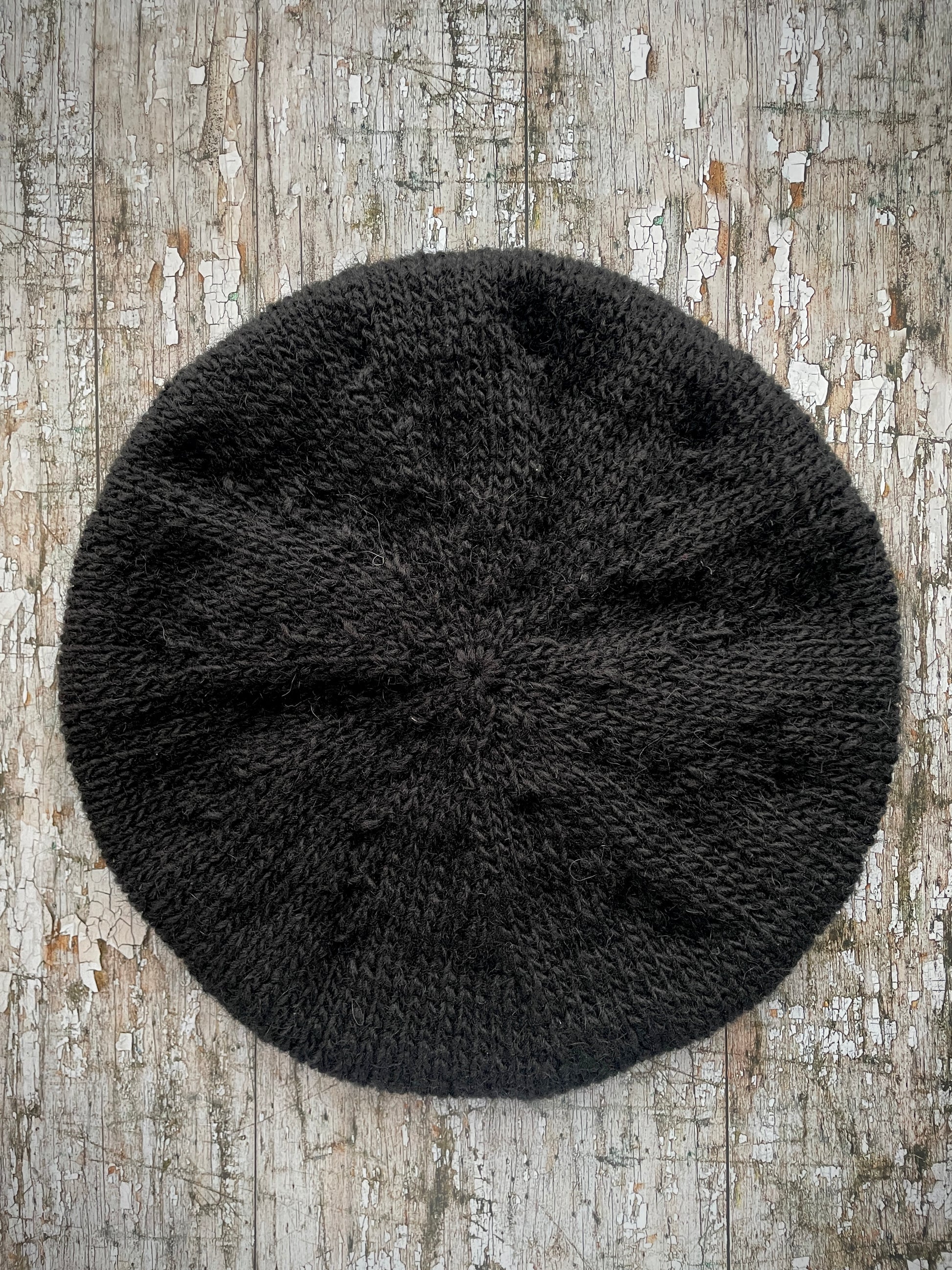 Hand Knitted Wool Black + Grey Tweed

Beautifully hand knitted beret in Icelandic pure wool, perfect for keeping your head warm on cold days, knitted in black, with a grey tweed ribbed band that gives the hat a snug fit.

SIZE: adult.

DIAMETER: 11" / 28cm.

CARE: hand wash or machine wash on wool cycle at 30 degrees, dry flat, do not tumble dry.