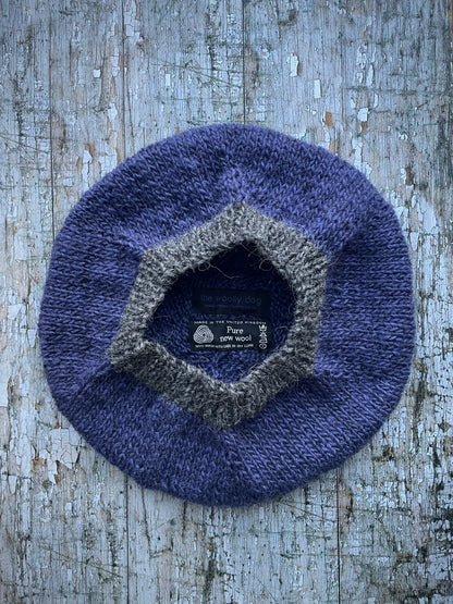 Hand Knitted Wool Lavender + Grey Tweed

Beautifully hand knitted beret in Icelandic pure wool, perfect for keeping your head warm on cold days, knitted in lavender, with a grey tweed ribbed band that gives the hat a snug fit.

SIZE: adult.

DIAMETER: 11" / 28cm.

CARE: hand wash or machine wash on wool cycle at 30 degrees, dry flat, do not tumble dry.