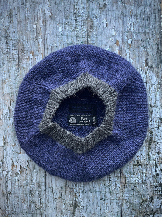 Hand Knitted Wool Lavender + Grey Tweed

Beautifully hand knitted beret in Icelandic pure wool, perfect for keeping your head warm on cold days, knitted in lavender, with a grey tweed ribbed band that gives the hat a snug fit.

SIZE: adult.

DIAMETER: 11" / 28cm.

CARE: hand wash or machine wash on wool cycle at 30 degrees, dry flat, do not tumble dry.