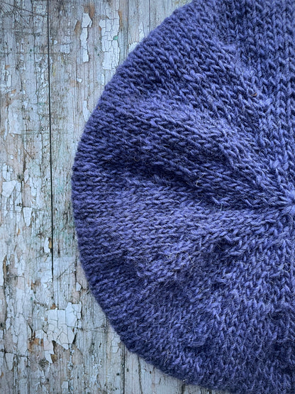 Hand Knitted Wool Lavender + Grey Tweed

Beautifully hand knitted beret in Icelandic pure wool, perfect for keeping your head warm on cold days, knitted in lavender, with a grey tweed ribbed band that gives the hat a snug fit.

SIZE: adult.

DIAMETER: 11" / 28cm.

CARE: hand wash or machine wash on wool cycle at 30 degrees, dry flat, do not tumble dry.