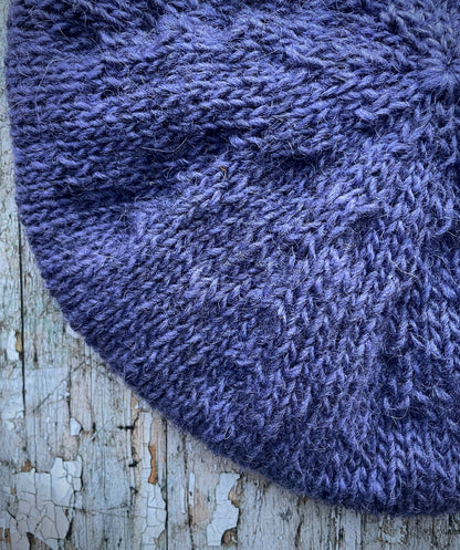 Hand Knitted Wool Lavender + Grey Tweed

Beautifully hand knitted beret in Icelandic pure wool, perfect for keeping your head warm on cold days, knitted in lavender, with a grey tweed ribbed band that gives the hat a snug fit.

SIZE: adult.

DIAMETER: 11" / 28cm.

CARE: hand wash or machine wash on wool cycle at 30 degrees, dry flat, do not tumble dry.